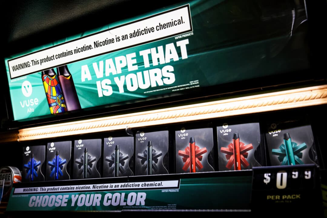 Vuse electronic cigarette packages are displayed at a shop in the Brooklyn borough of New York City on Oct. 13, 2021. The Food and Drug Administration authorized the sale of R.J. Reynolds's Vuse Solo e-cigarette and its tobacco-flavored cartridges the day before, saying data show that the product may reduce smokers’ exposure to harmful chemicals found in traditional cigarettes. (Michael M. Santiago/Getty Images)
