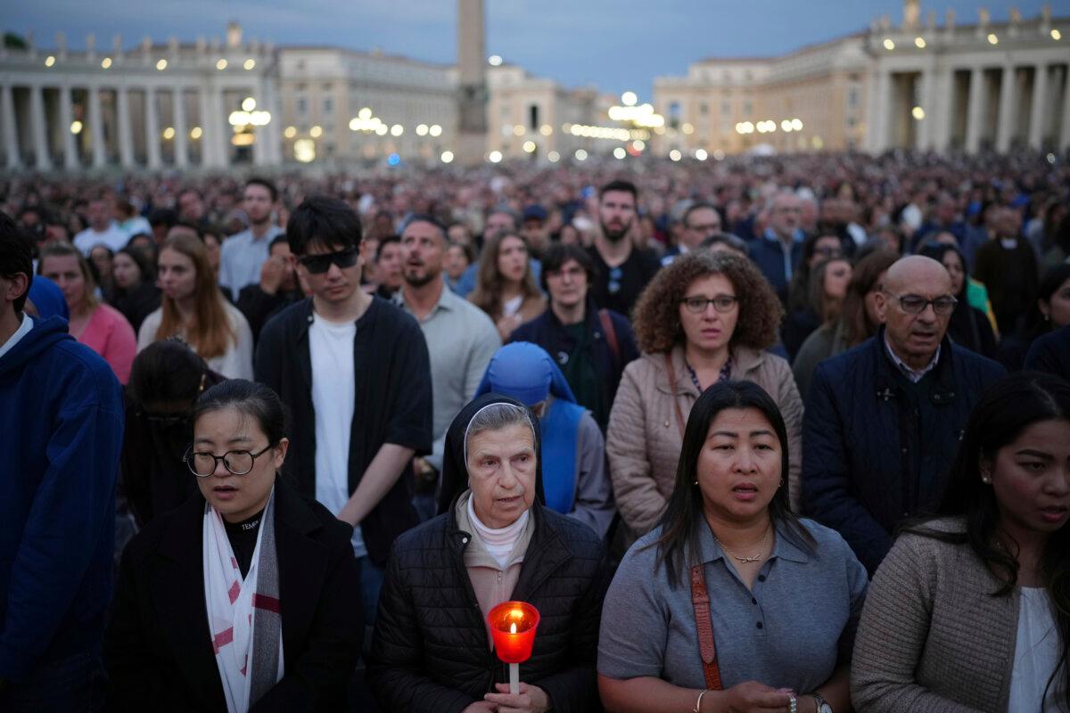 The faithful gather for a rosary prayer for the late Pope Francis, in St. Peter's Square in the Vatican, Rome, on April 21, 2025 (Alessandra Tarantino/AP)