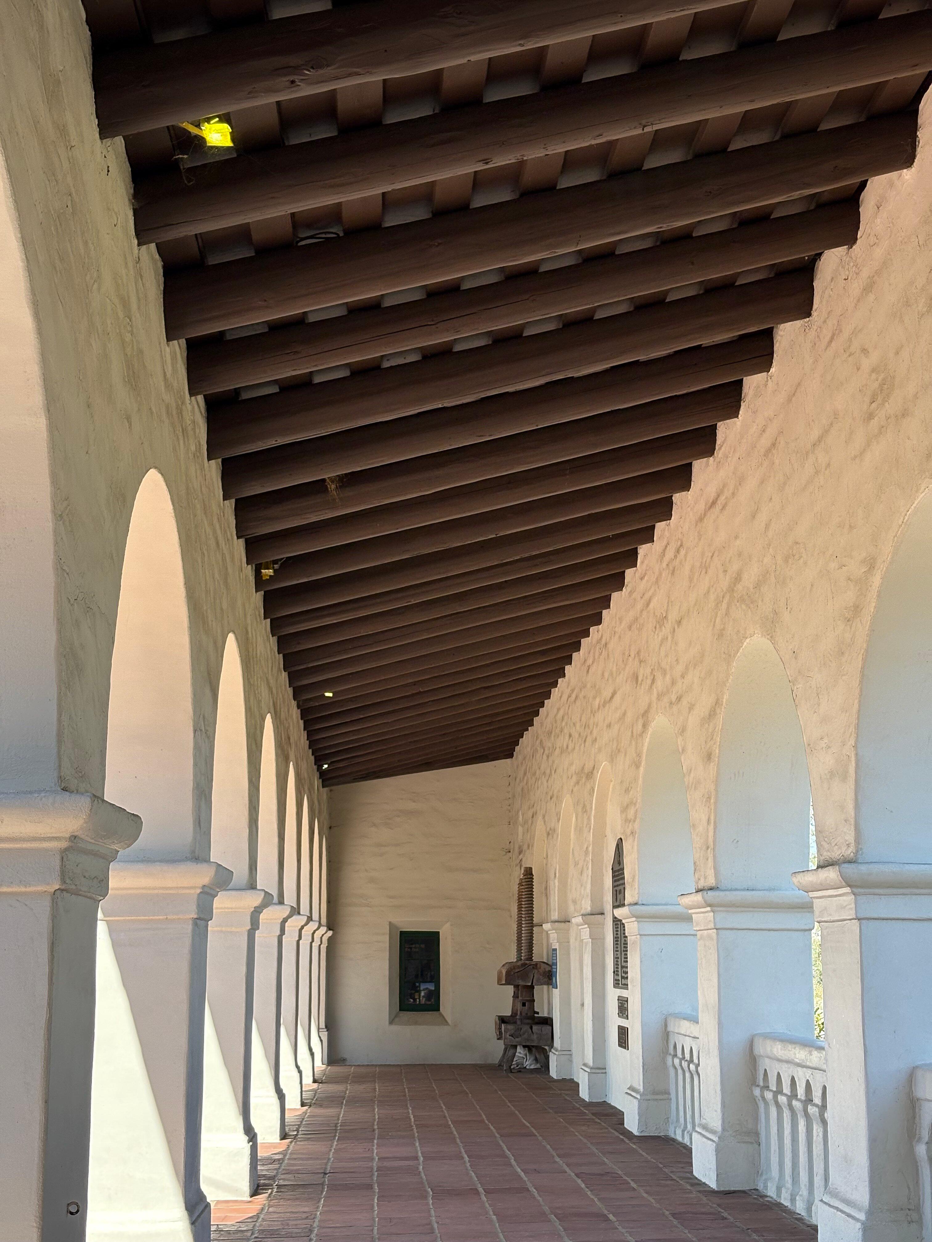 The presidio's long outdoor hallways are emblematic of Spanish mission-style architecture. (Deena C. Bouknight)