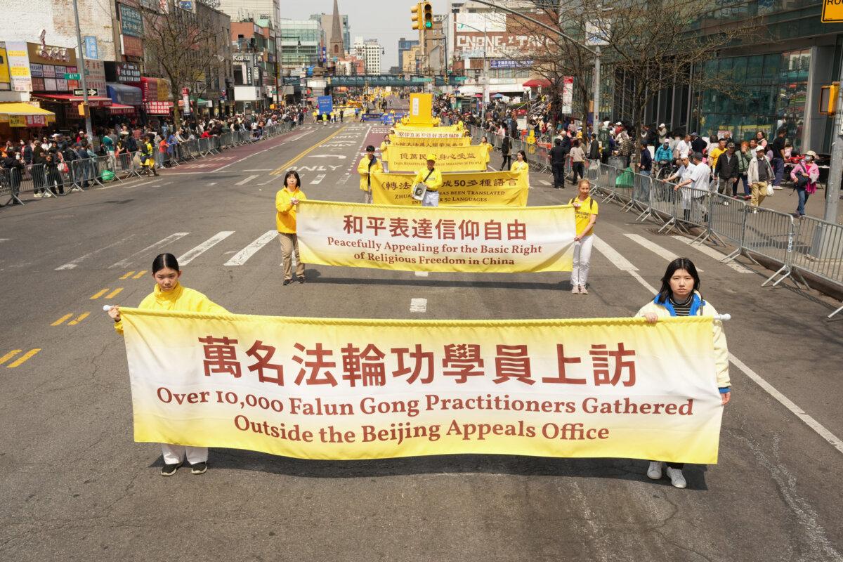 Falun Gong practitioners take part in a parade to commemorate the 26th anniversary of the April 25 appeal, in Flushing, New York, on April 19, 2025. (Larry Dye/The Epoch Times)