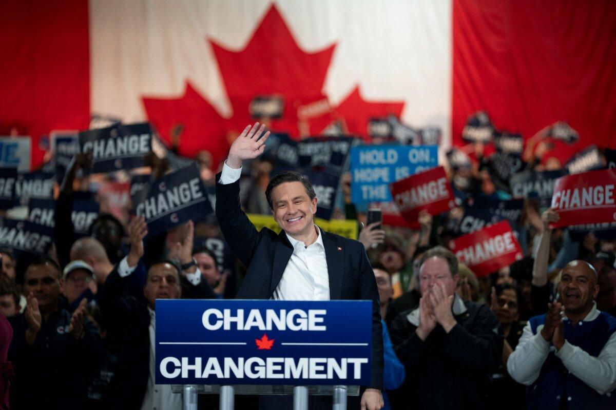Conservative leader Pierre Poilievre waves to the crowd at a campaign rally in Oakville, Ontario, Canada, on April 27, 2025. (Peter Power/AFP via Getty Images)