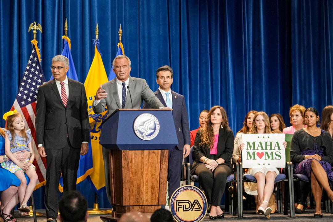 Secretary of Health and Human Services Robert F. Kennedy Jr. speaks at a news conference with Food and Drug Administration Commissioner Marty Makary (R) and NIH Director Jay Bhattacharya (L) at the Department of Health and Human Services in Washington on April 22, 2025. The Trump administration announced plans to ban petroleum-based synthetic dyes from the U.S. food supply. The move has been welcomed by health experts and marks a rare point of bipartisan agreement. (Oliver Contreras/AFP via Getty Images)