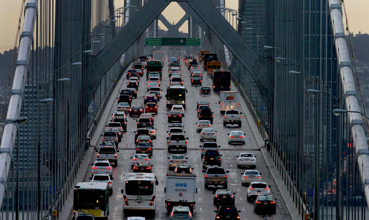 Vehicles make their way westbound on Interstate 80 across the San Francisco-Oakland Bay Bridge as seen from Treasure Island in San Francisco on Dec. 10, 2015. (Ben Margot/AP Photo)