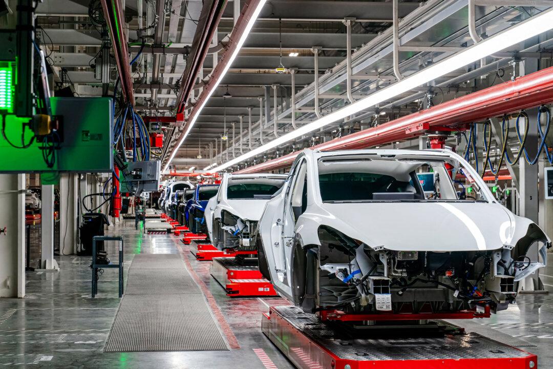 Cars on the assembly line during a tour of the Tesla Giga Texas manufacturing facility ahead of its grand opening party in Austin, Texas, on April 7, 2022. (Suzanne Cordeiro/AFP via Getty Images)