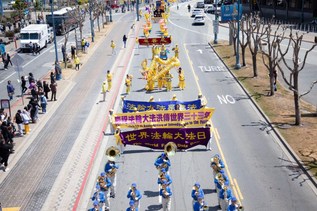 A parade celebrating World Falun Dafa Day marches through San Francisco on May 3, 2025. (Lear Zhou/The Epoch Times)