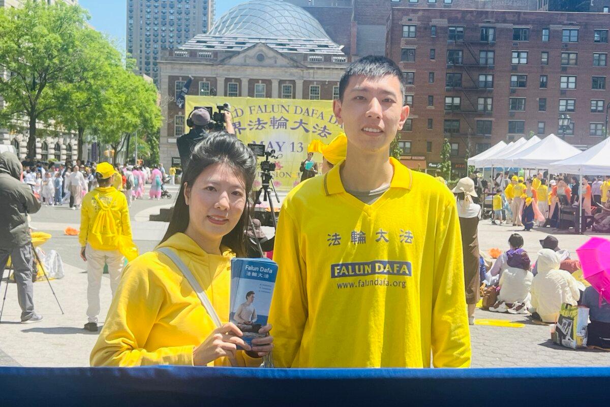 Sand Zhu and his wife at Union Square in New York City on May 11, 2025. (Zhao Fenni/The Epoch Times)