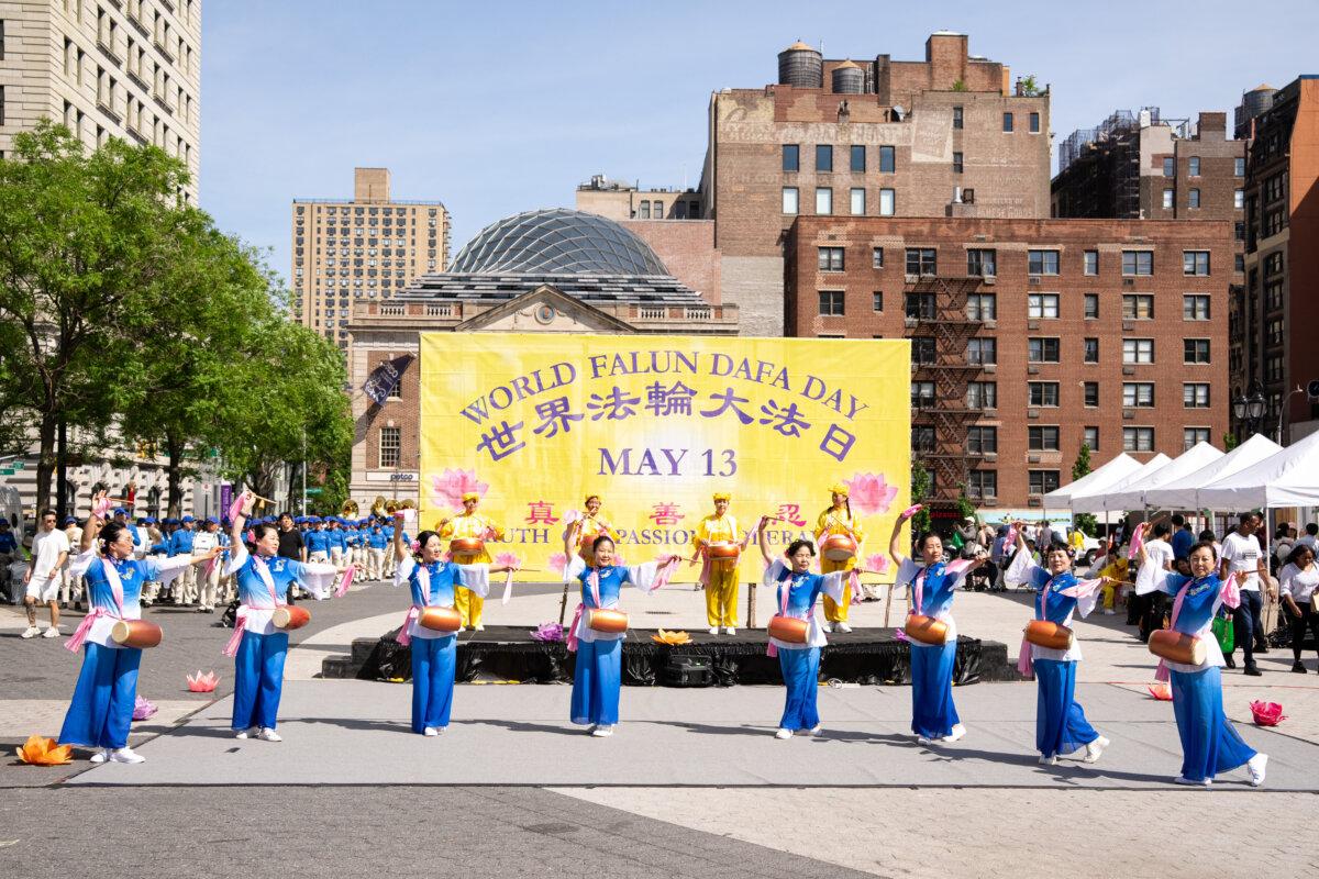 A performance commemorating World Falun Dafa Day at Union Square in New York City on May 11, 2025. (Larry Dye/The Epoch Times)