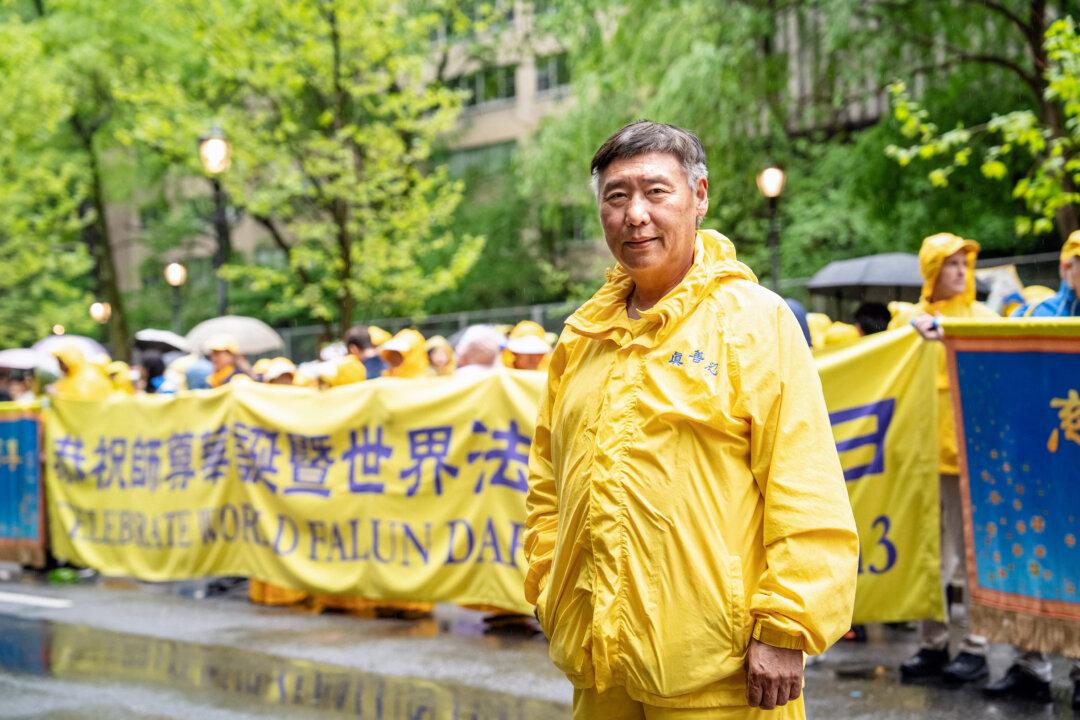 George Miao takes part in a parade to celebrate World Falun Dafa Day and call for an end of the persecution in China, in New York City on May 9, 2025. (Samira Bouaou/The Epoch Times)