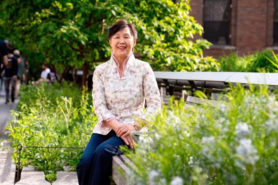 Wang Yuguang in New York City on May 11, 2025. Wang said more than 100 of her relatives in China started practicing Falun Gong after she began. (Samira Bouaou/The Epoch Times)