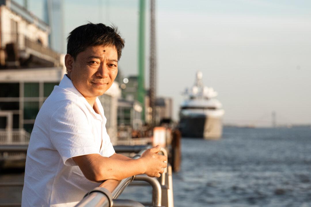 Hu Yang in New York City on May 10, 2025. Hu said his attitude underwent a 180-degree positive turn after he began practicing Falun Gong. (Samira Bouaou/The Epoch Times)