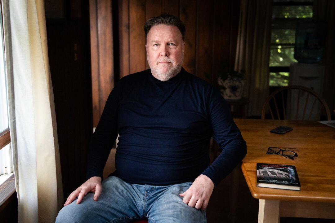 Kevin Barry, author and autism awareness advocate, in Port Washington, N.Y., on May 1, 2025. (Samira Bouaou/The Epoch Times)