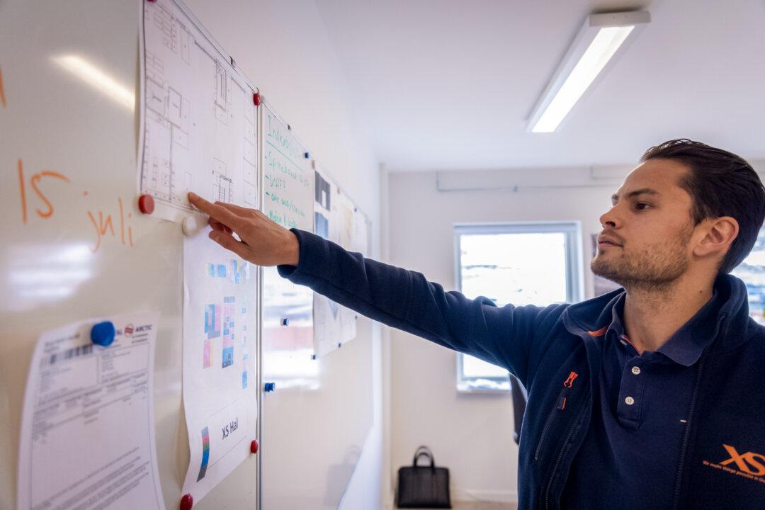 (Top) Pituffik Space Base, formerly known as Thule Air Base, a U.S. Space Force base located on the northwest coast of Greenland, on Oct. 4, 2023. (Bottom L) Tour guide Pakkutannguaq Larsen ties off a tourist boat in Nuuk, Greenland, on May 4, 2025. Larsen said that although she is in favor of Greenland's independence, she is not eager for more extractive industry. (Bottom R) Taatsi Olsen of Xploration Services Greenland looks at upcoming plans in Nuuk, Greenland, on May 4, 2025. The company supports mineral exploration on the island. (Thomas Traasdahl/Ritzau Scanpix/AFP via Getty Images, John Fredricks/The Epoch Times)