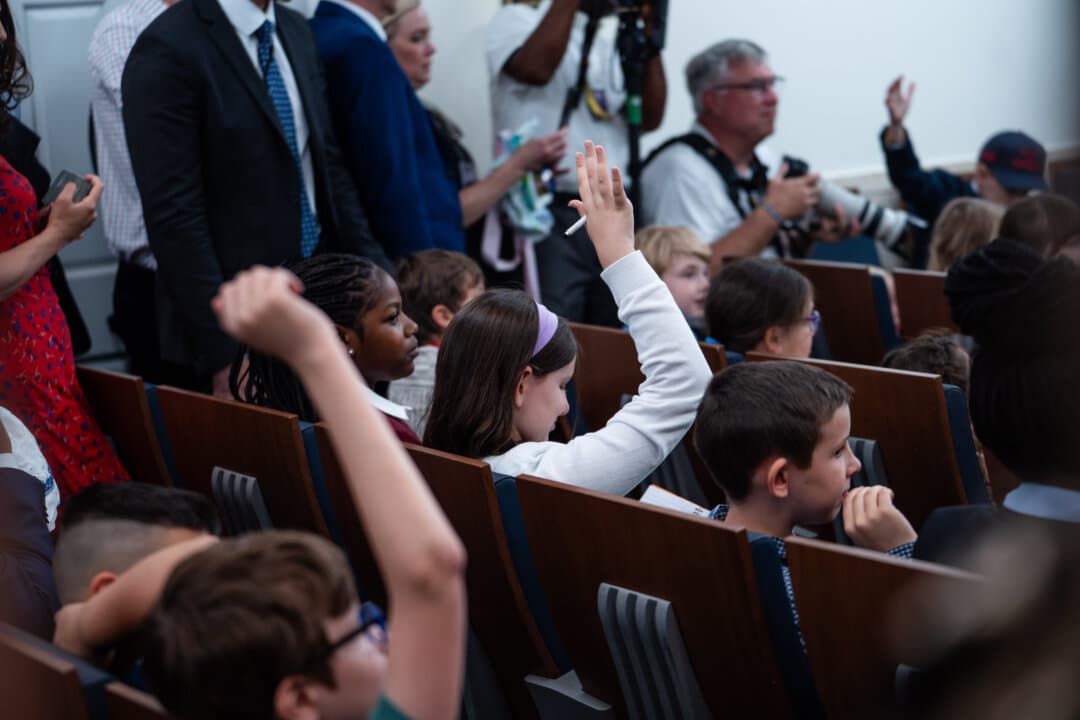 Children of members of the press attend a mock press conference with White House press secretary Karoline Leavitt during Take Our Sons and Daughters to Work Day in the press briefing room of the White House on May 20, 2025. (Madalina Vasiliu/The Epoch Times)