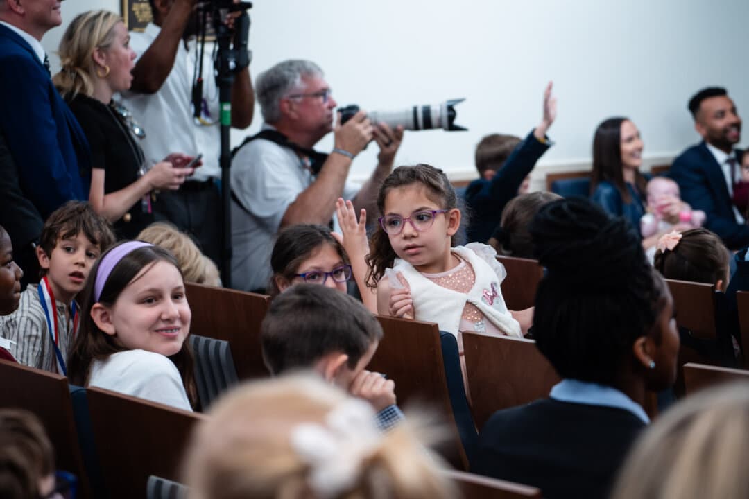 Children of members of the press attend a mock press conference with White House press secretary Karoline Leavitt during Take Our Sons and Daughters to Work Day in the press briefing room of the White House on May 20, 2025. (Madalina Vasiliu/The Epoch Times)
