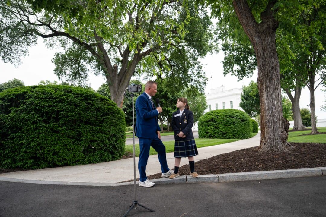 A girl gives an interview after attending a mock press conference with White House press secretary Karoline Leavitt during Take Our Sons and Daughters to Work Day at the White House on May 20, 2025. (Madalina Vasiliu/The Epoch Times)