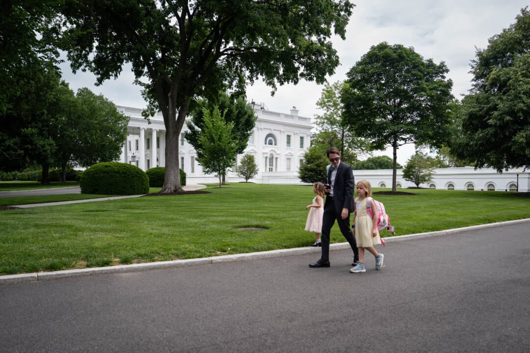 A reporter and his children leave after attending a mock press conference with White House press secretary Karoline Leavitt during Take Our Sons and Daughters to Work Day at the White House on May 20, 2025. (Madalina Vasiliu/The Epoch Times)