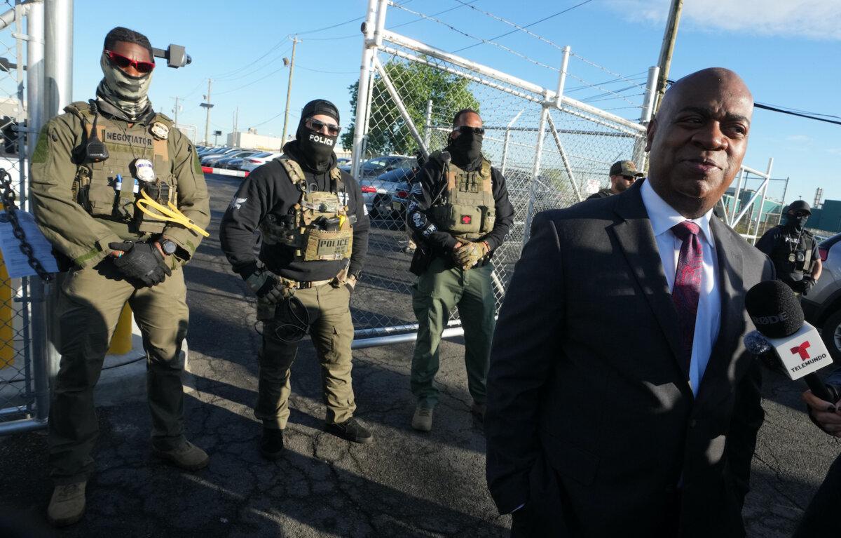Mayor Ras Baraka of Newark speaks to the press near ICE agents at a rally outside an immigrant detention center in Elizabeth, N.J., on May 7, 2025. (Timothy A. Clary/AFP via Getty Images)