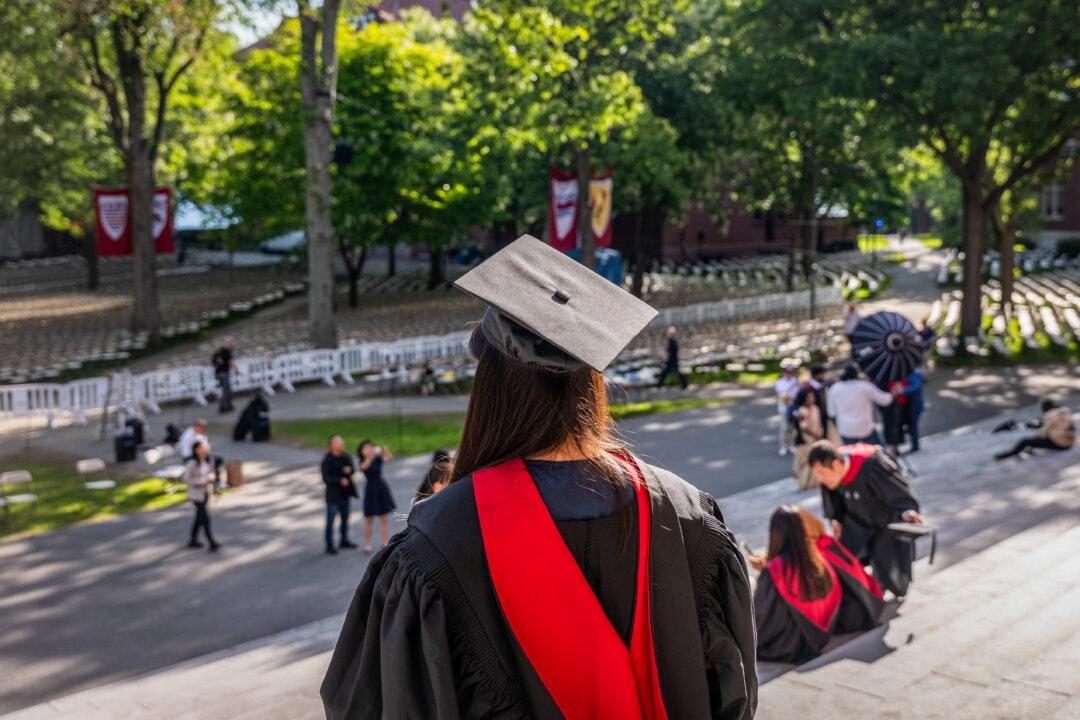 Students, faculty, and family gather for Commencement in Harvard Yard in Cambridge, Mass., on May 28, 2025. The Department of Homeland Security revoked Harvard’s certification to enroll international students on May 22, but a U.S. judge temporarily blocked the order after the school filed a lawsuit. (Spencer Platt/Getty Images)