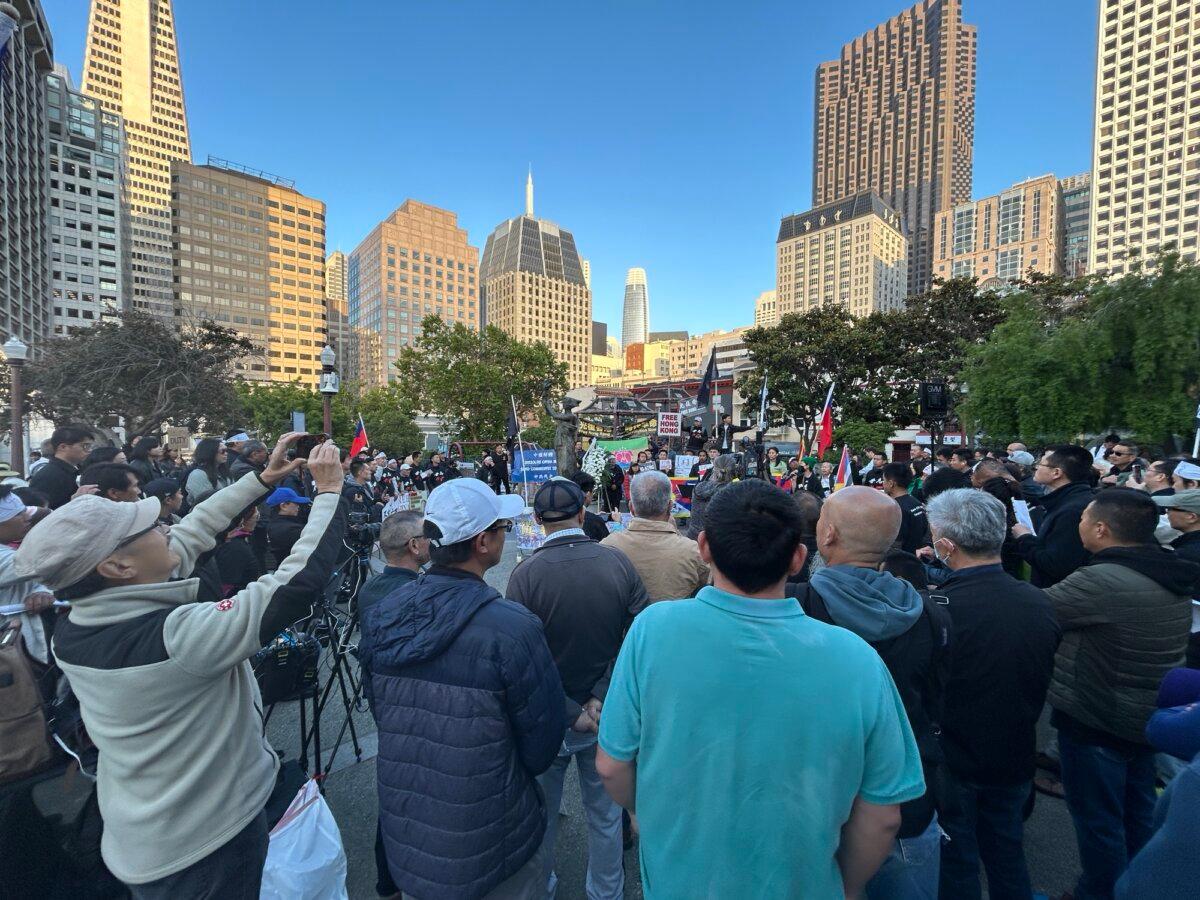 Hundreds of people gather at Portsmouth Square in San Francisco on June 3, 2025, to attend a candlelight vigil in memory of the Tiananmen Square Massacre victims. (Nathan Su/The Epoch Times)