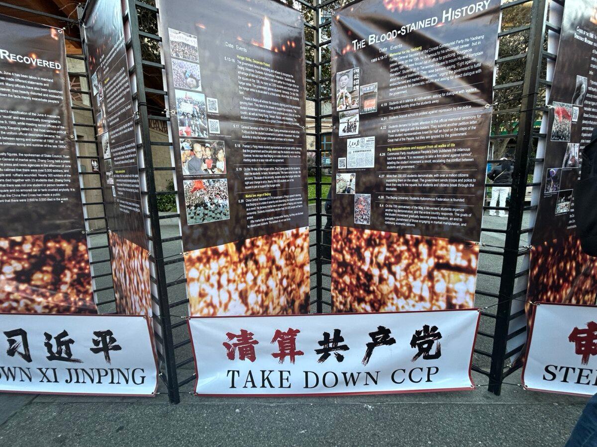 Banners at the candlelight vigil in Portsmouth Square in San Francisco on June 3, 2025. (Nathan Su/The Epoch Times)