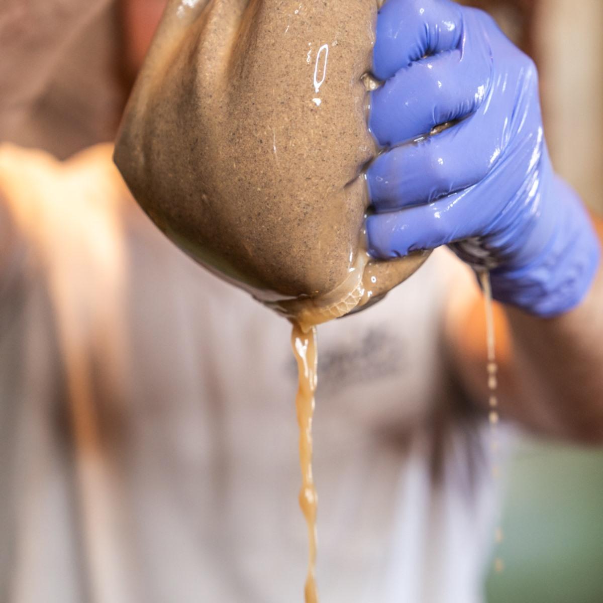 Powdered kava roots are pressed to make kava tea. (Courtesy of Root of Happiness)