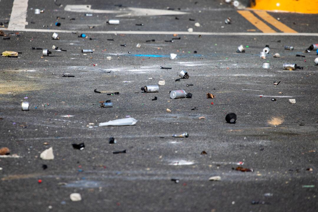 Tear gas canisters on the street during a protest following federal immigration operations, in the Compton neighborhood of Los Angeles on June 7, 2025. (Ringo Chiu/AFP via Getty Images)