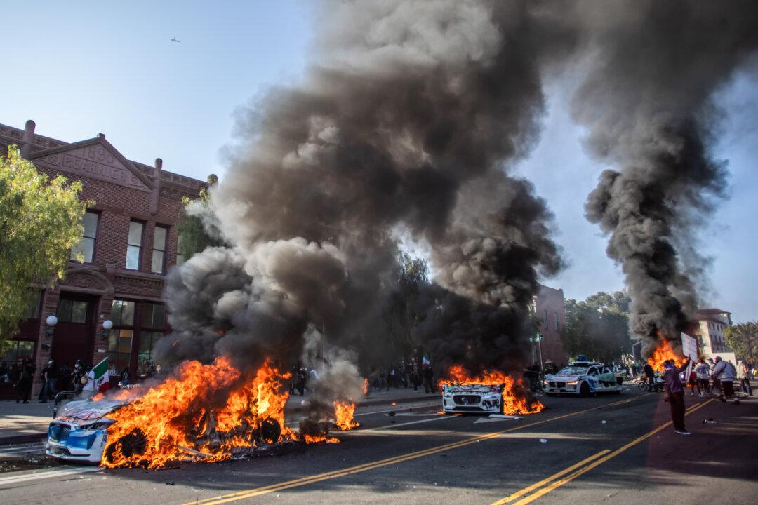Self-driving cars are set on fire in Los Angeles on June 8, 2025. (Apu Gomes/Getty Images)