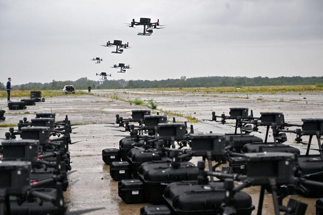 DJI Matrice 300 reconnaissance drones, purchased under the Army of Drones program, are seen during test flights before being deployed to the front line in the Kyiv region of Ukraine on Aug. 2, 2022. (Sergei Supinsky/AFP via Getty Images)