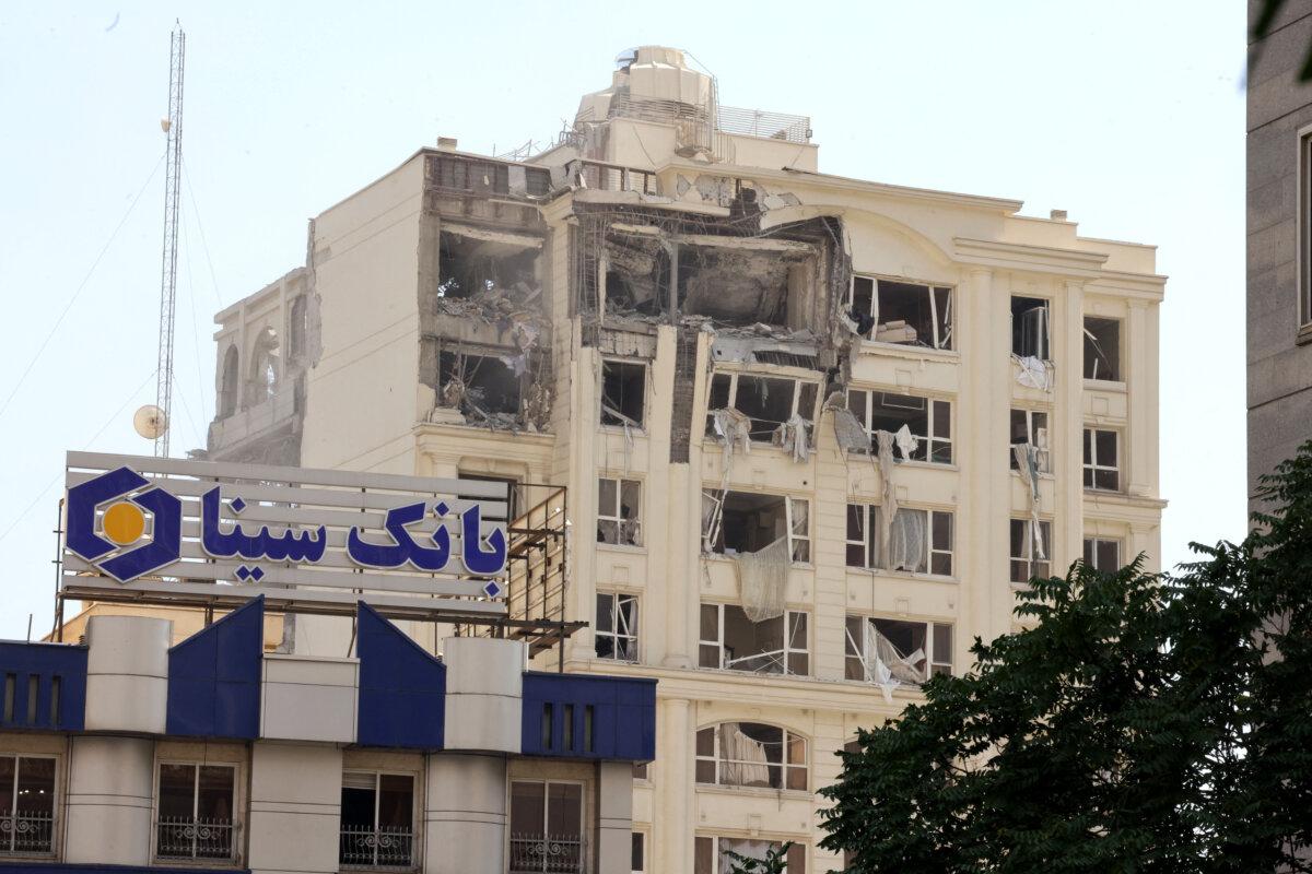 This picture shows a building damaged in an Israeli strike on Tehran on June 13, 2025. Israel hit about 100 targets in Iran on June 13. (Atta Kenare /AFP via Getty Images)