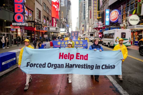 Falun Gong practitioners take part in a parade to celebrate World Falun Dafa Day while calling for an end of the persecution in China, in New York City, on May 10, 2024. (Samira Bouaou/The Epoch Times)