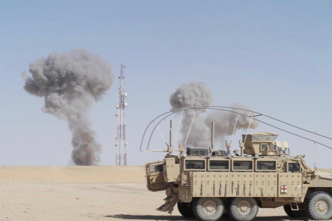 Manygoats keeping watch in Saab Al Bour, Iraq. (Courtesy of Larrison Manygoats)