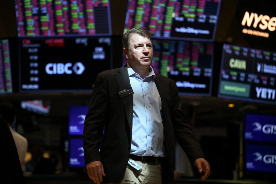 A trader works on the floor of the New York Stock Exchange at the opening bell on June 13, 2025. Oil prices soared and stocks sank Friday after Israel launched strikes on nuclear and military sites in Iran, stoking fears of a full-blown war. (Angela Weiss/AFP via Getty Images)