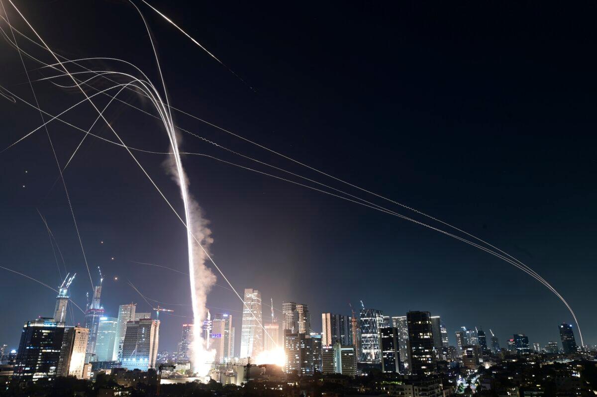 Israeli Iron Dome air defense system fires to intercept missiles over Tel Aviv, Israel on June 13, 2025. (AP Photo/Tomer Neuberg)