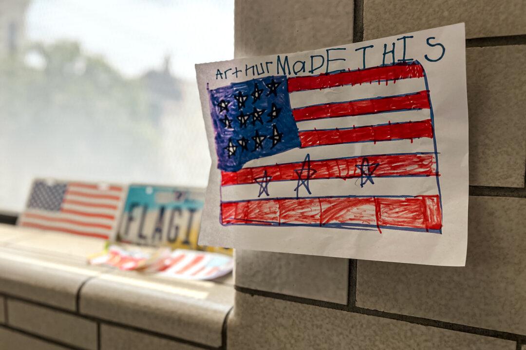 A flag made by 7-year-old Arthur Schaller IV hangs at his family's firm, the National Flag Company, in Cincinnati on June 6, 2025. (Nathan Worcester/The Epoch Times)