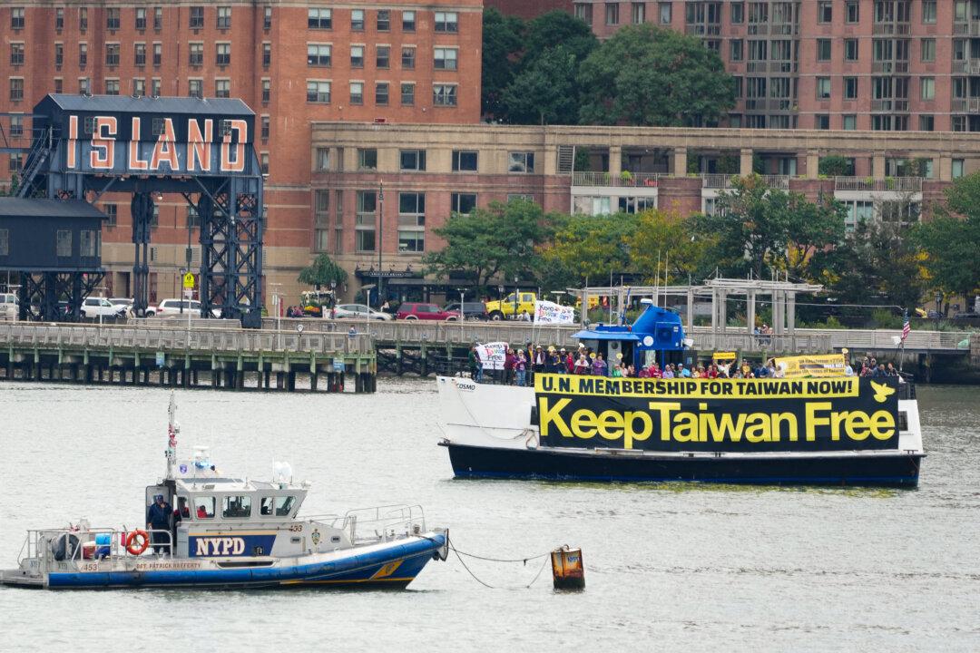 A boat supporting Taiwanese independence and UN membership moves up the East River past the United Nations in New York, on Sept. 27, 2024. (Bryan R. Smith/AFP via Getty Images)