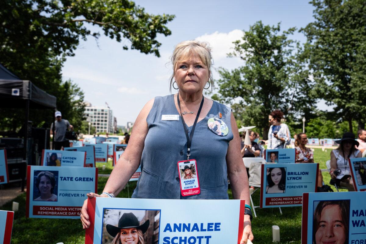 Lori Schott from Colorado, mother of Annalee Schott who took her own life when she was 18 after being bullied on social media, takes part in Social Media Victims Remembrance Day at the Upper Senate Park on Capitol Hill in Washington on June 23, 2025. (Madalina Kilroy/The Epoch Times)