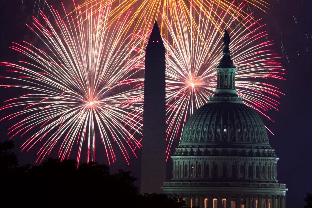 Fireworks explode over the National Mall in Washington as the U.S. Capitol and National Monument are seen on July 4, 2017. (Paul J. Richards/AFP via Getty Images)