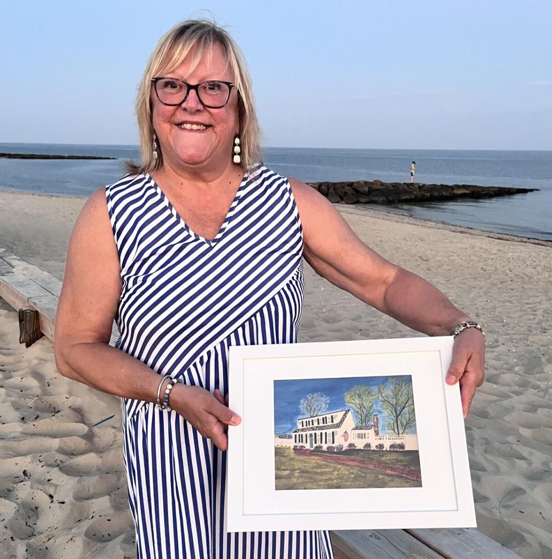 Nancy Turgeon displays her artwork, which is her side job. (Mary T. Prenon/The Epoch Times)