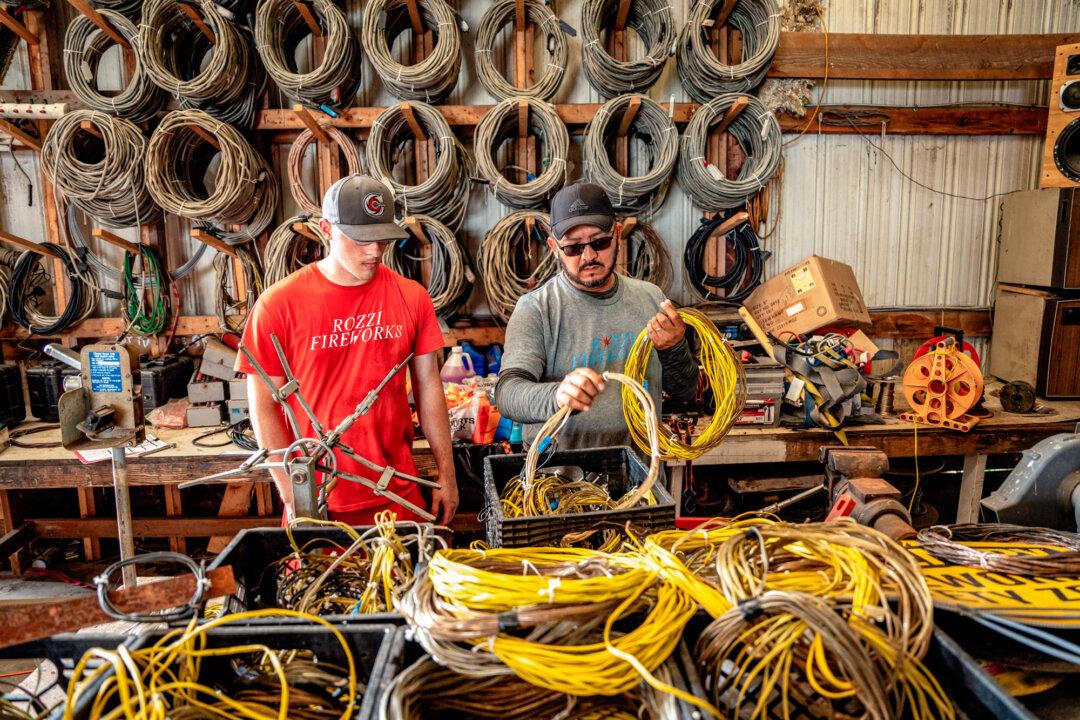 Workers prepare for upcoming shows at Rozzi’s Famous Fireworks site in Martinsville, Ohio, on June 26, 2025. With only 11 full-time staff—including a fifth-generation Rozzi—the company leans on 300 part-time workers. (Samira Bouaou/The Epoch Times)