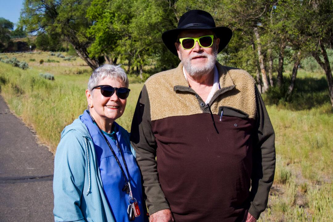 Keith Aikenhead, 72, and his wife, of Elko, Nevada, are on a trail near I-80 on June 23, 2025. (Travis Gillmore/The Epoch Times)