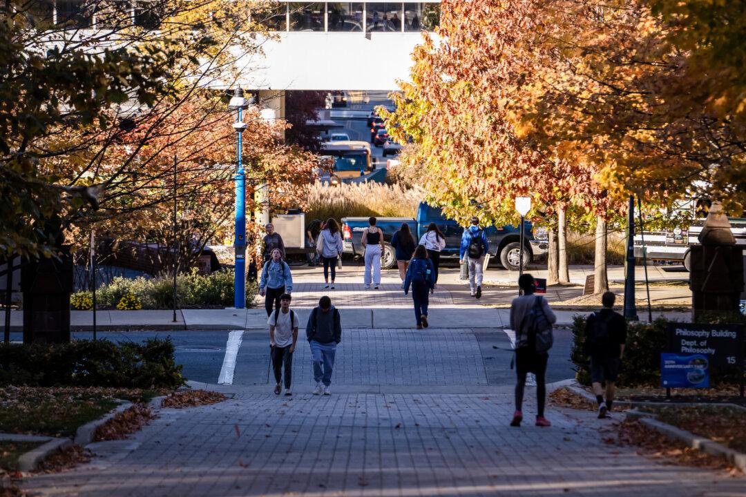 People walk on the Lehigh University campus in Bethlehem, Pa., on Oct. 25, 2024. The legislation will affect higher education by reducing student grants and adjusting loan repayment plans and tax codes for institutions. (Madalina Vasiliu/The Epoch Times)