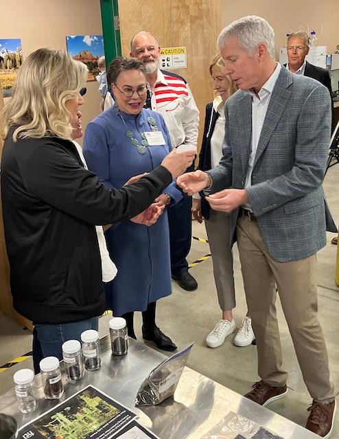 Energy Secretary Chris Wright shares pore sample concentrates with Rep. Harriet Hageman (R-Wyo.) (C) and Sen. Cynthia Lummis (R-Wyo.) (L) during a tour of the Ramaco Resources offices and labs near Ranchester, Wyo., on July 11, 2025. (John Haughey/The Epoch Times)