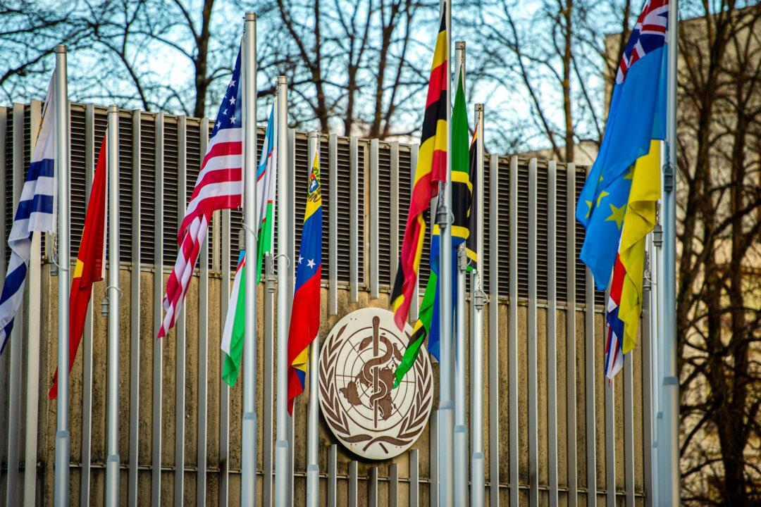 The logo of the WHO and the U.S. flag outside the World Health Organization headquarters in Geneva on Jan. 23, 2025. The Trump administration cited the WHO’s handling of the COVID-19 pandemic and disproportionate U.S. funding as reasons for withdrawing from the organization. (Robert Hradil/Getty Images)