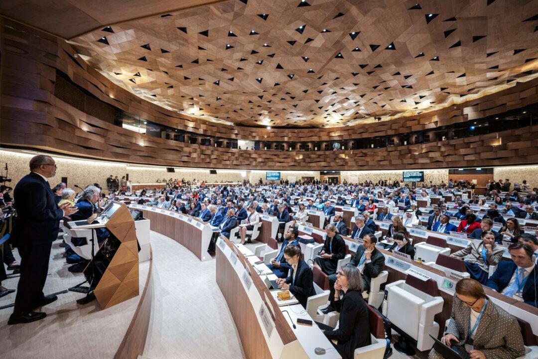 World Health Organization Director-General Tedros Adhanom Ghebreyesus (L) delivers his report before delegates during the 78th World Health Assembly in Geneva on May 19, 2025. Member states approved the world’s first pandemic agreement. (Fabrice Coffrini/AFP via Getty Images)