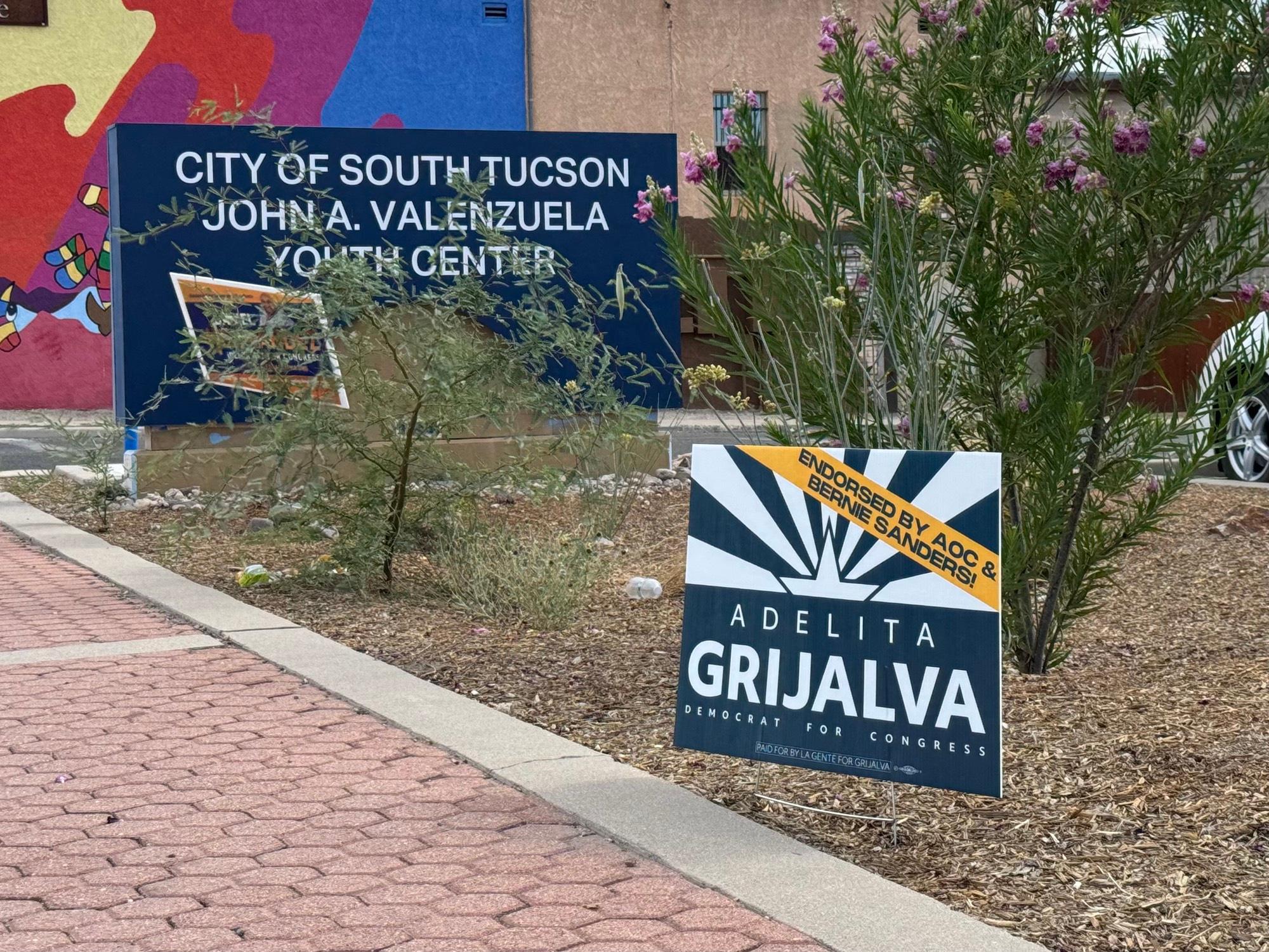 A campaign sign for Adelita Grijalva is placed outside a polling center in South Tucson, Ariz., on July 15, 2025. (Arjun Singh/The Epoch Times)
