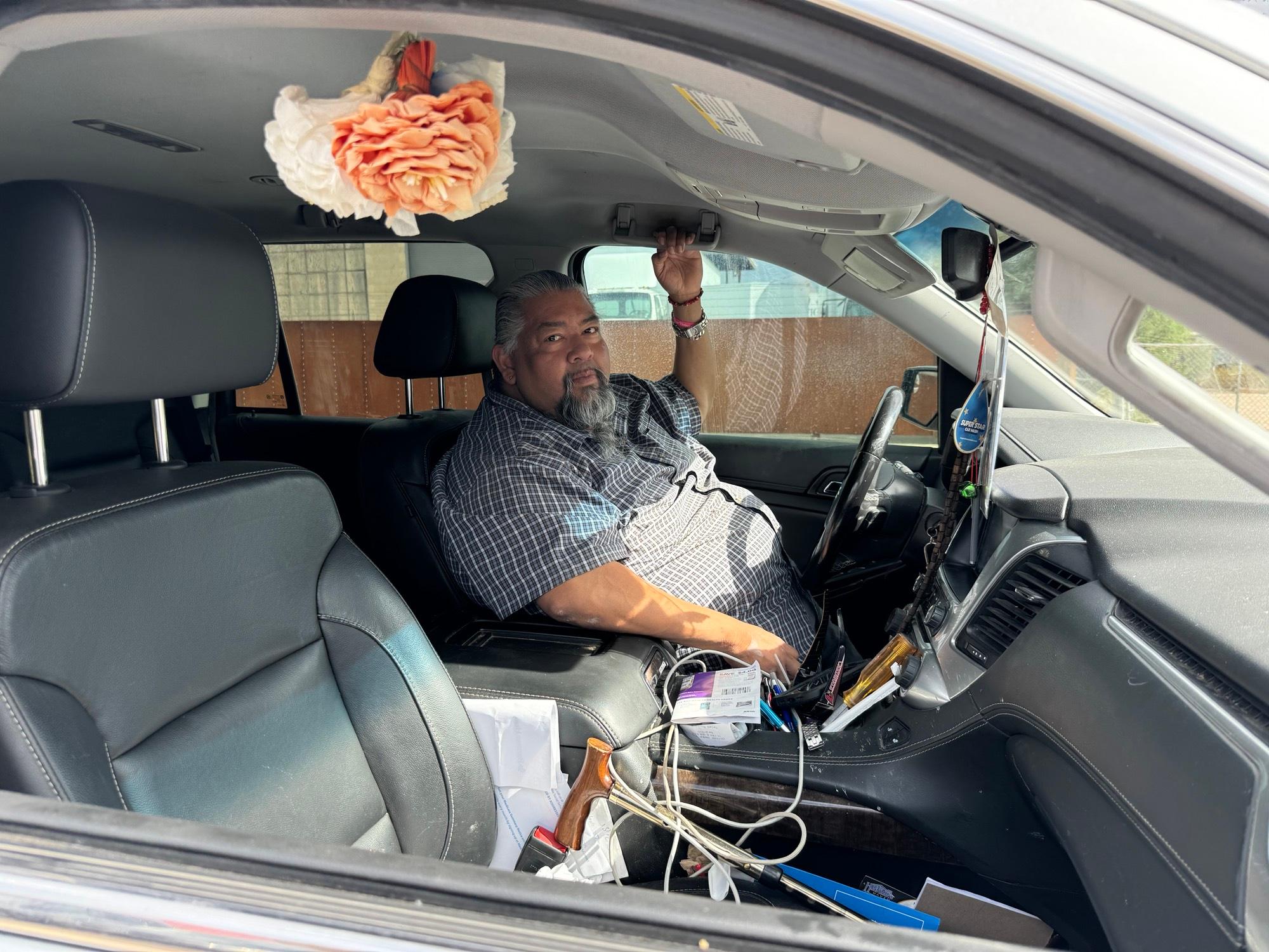Francisco Muñoz, a tribal voter, is pictured as he drives away from a polling station after voting on July 15, 2025, in South Tucson, Ariz. (Arjun Singh/The Epoch Times)