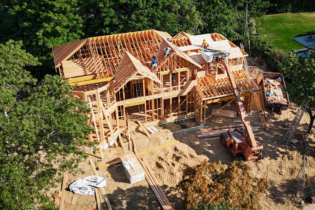 Builders work on new house construction in Old Bethpage, N.Y., on Sept. 3, 2024. (Bruce Bennett/Getty Images)