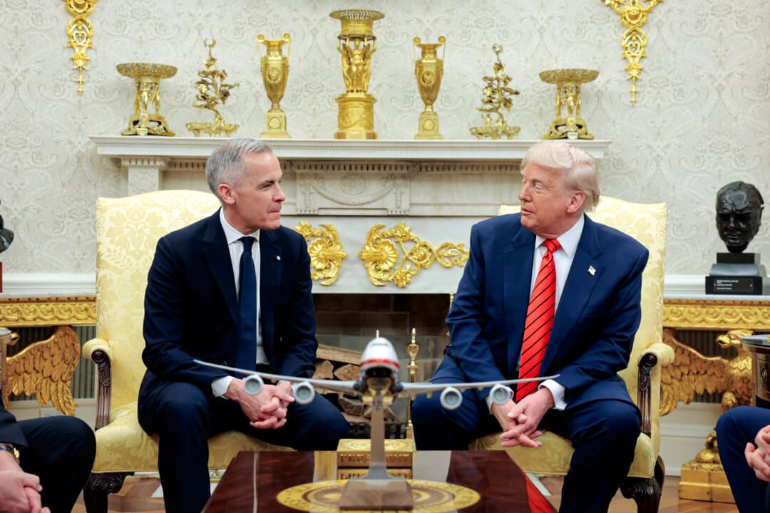 President Donald Trump (R) meets with Canadian Prime Minister Mark Carney in the Oval Office on May 6, 2025. In July, Trump announced that tariffs on certain Canadian imports will rise to 35 percent starting Aug. 1. (Anna Moneymaker/Getty Images)