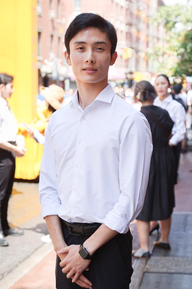 Shen Yun Performing Arts dancer Sun Hung-wei joins a march to call for an end to the Chinese Communist Party's 26 years of ongoing persecution against Falun Gong, in New York City on July 20, 2025. (Benny Zhang/The Epoch Times)