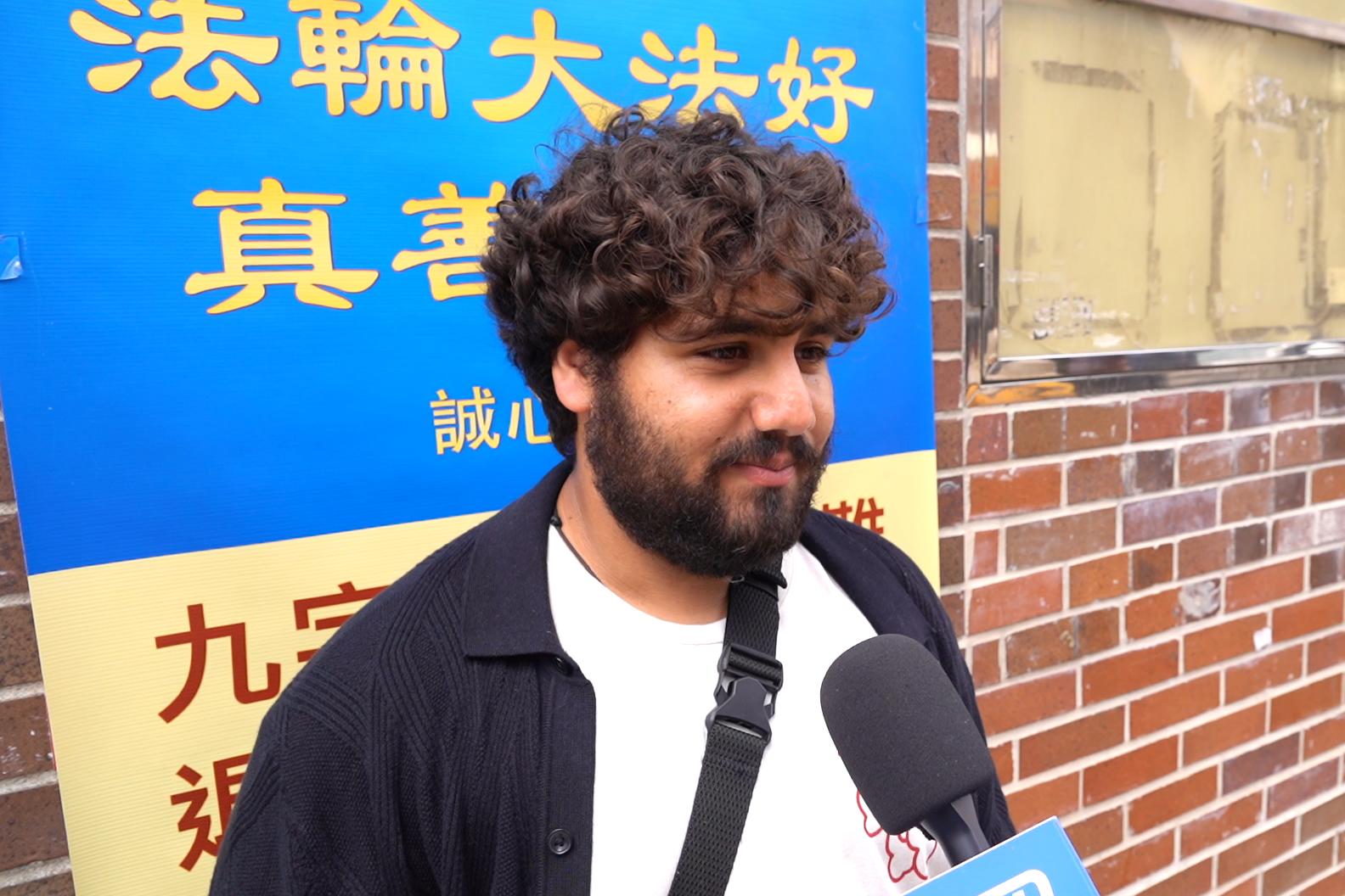 Ehab Aiqtam, a medical researcher, in Philadelphia Chinatown on July 20, 2025. (William Huang/The Epoch Times)